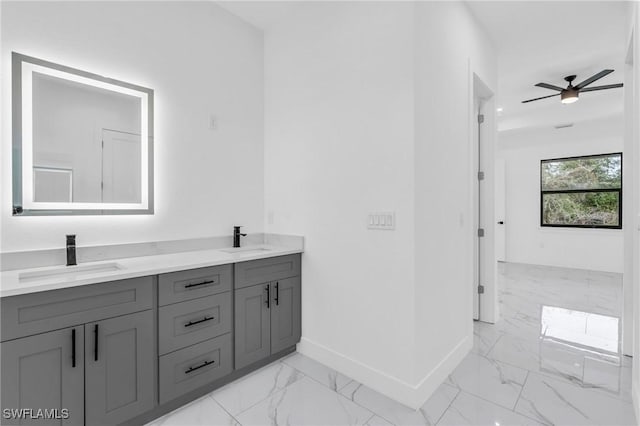 bathroom with ceiling fan and vanity