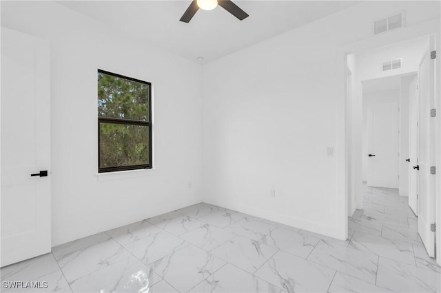 empty room featuring ceiling fan