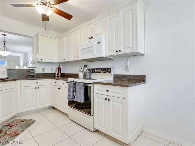 kitchen with white appliances, white cabinets, pendant lighting, ceiling fan, and light tile patterned flooring