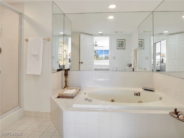 bathroom with ceiling fan, separate shower and tub, and tile patterned flooring