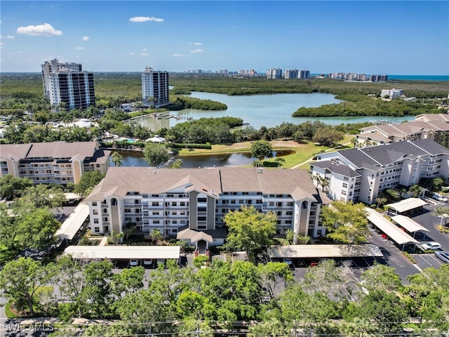 bird's eye view with a water view