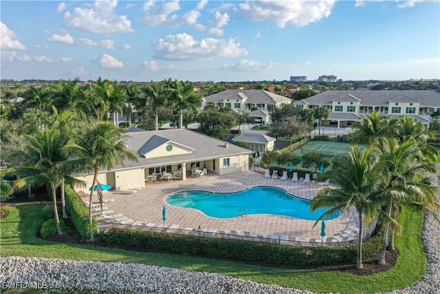 view of swimming pool with a patio area