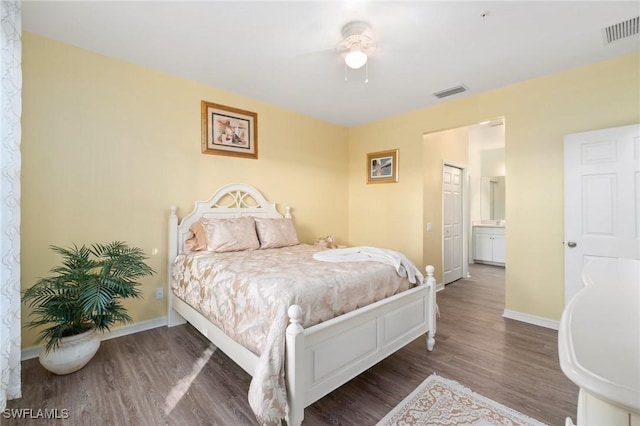 bedroom featuring dark wood-type flooring and ceiling fan