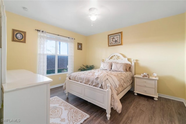 bedroom featuring dark wood-type flooring