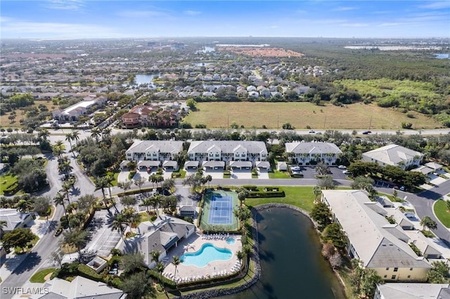 birds eye view of property featuring a water view