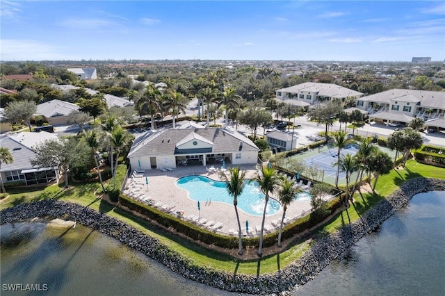 birds eye view of property featuring a water view