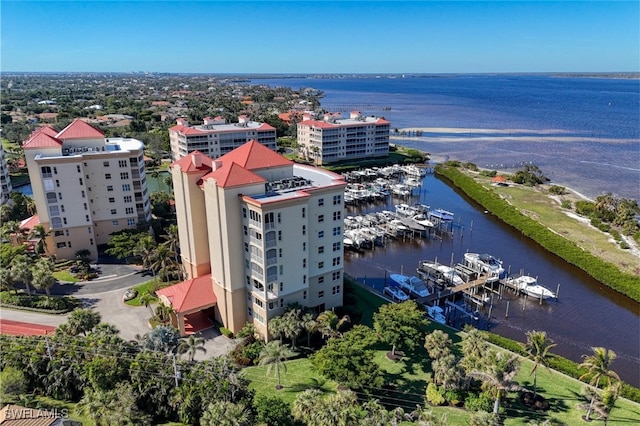 birds eye view of property featuring a water view