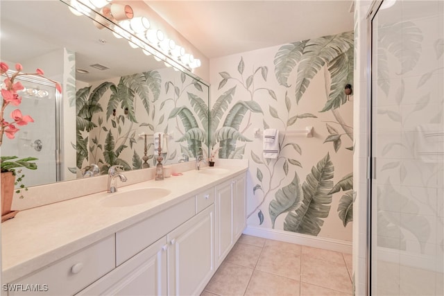 bathroom featuring an enclosed shower, vanity, and tile patterned floors