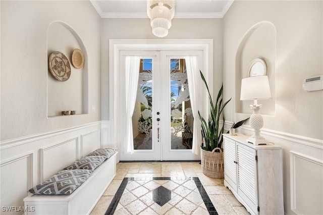 entryway with french doors and crown molding