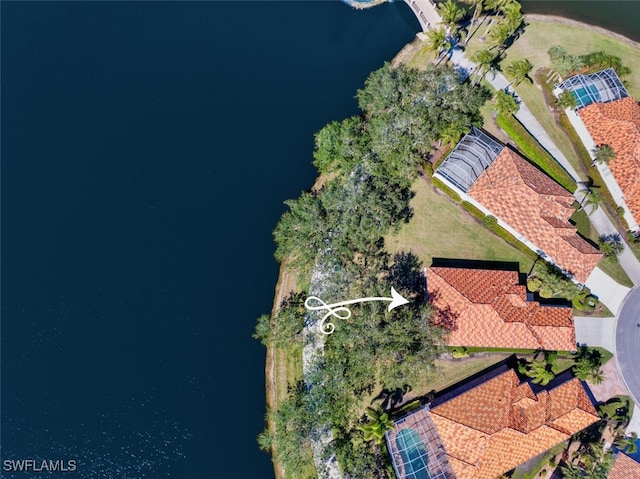 birds eye view of property featuring a water view