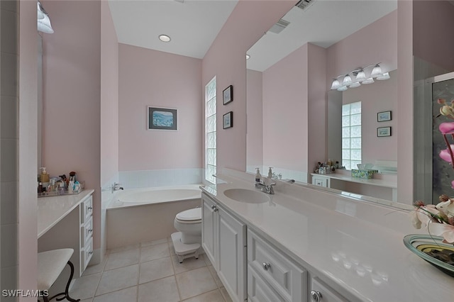 bathroom featuring a bath, toilet, tile patterned floors, vanity, and a shower with door