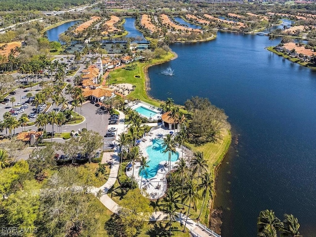 birds eye view of property featuring a water view