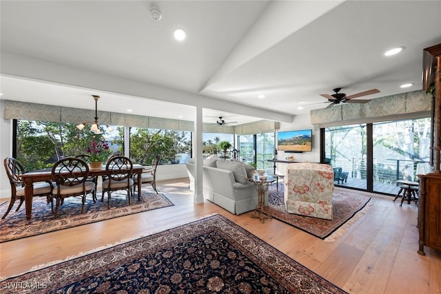 living area with recessed lighting, a ceiling fan, and light wood-style floors