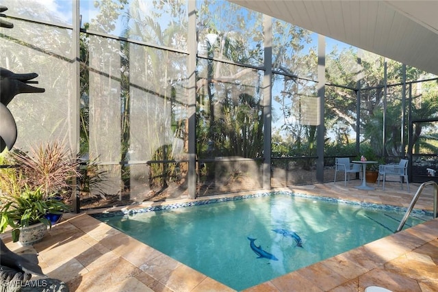 outdoor pool featuring glass enclosure and a patio