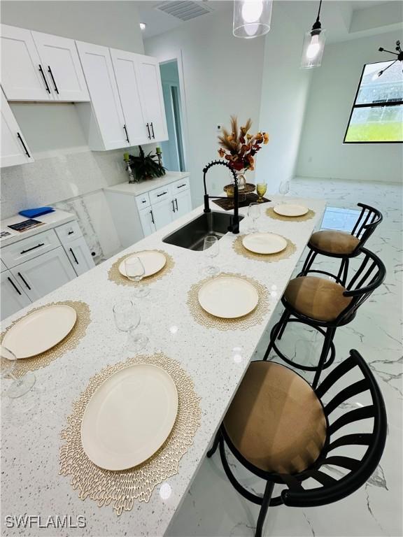 dining area with sink