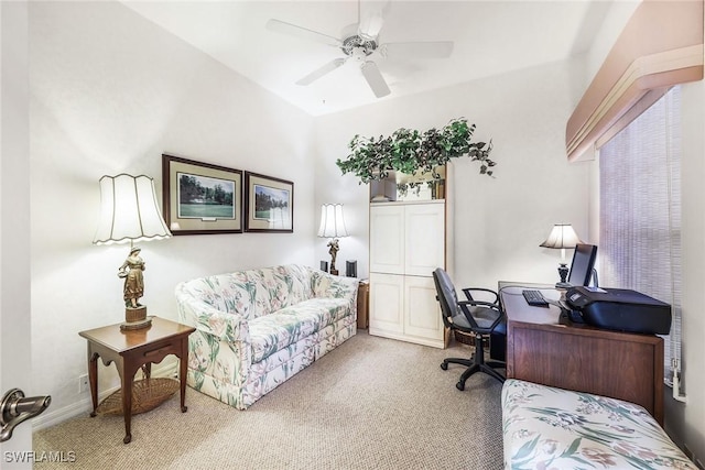 carpeted home office with ceiling fan