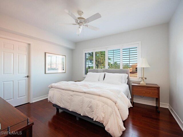 7425 Pelican Bay Blvd Unit 301, Naples, FL 34108 - bedroom featuring dark hardwood / wood-style flooring and ceiling fan