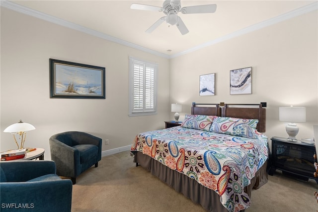 carpeted bedroom featuring ceiling fan and ornamental molding