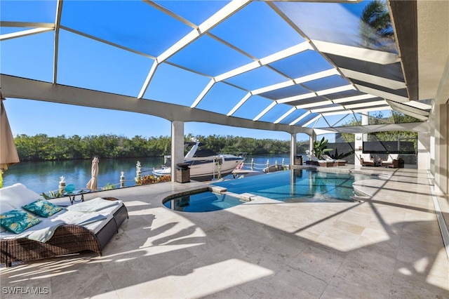 view of pool with a lanai, a patio, a boat dock, and a water view