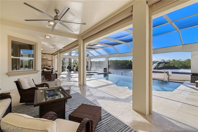 view of patio featuring a swimming pool with hot tub, an outdoor living space with a fire pit, ceiling fan, and glass enclosure