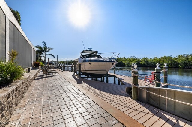 dock area featuring a water view