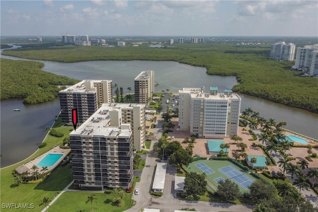 drone / aerial view with a water view