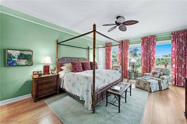 bedroom featuring ceiling fan and light hardwood / wood-style flooring