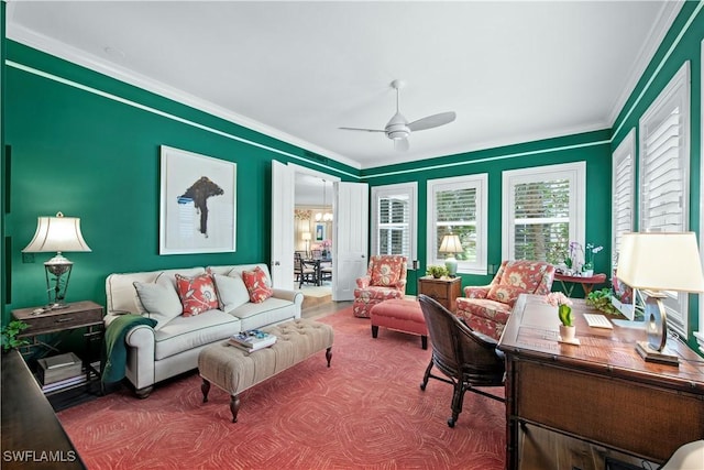 interior space featuring ceiling fan and crown molding