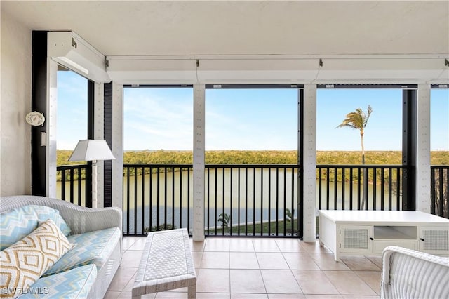 sunroom / solarium featuring a healthy amount of sunlight