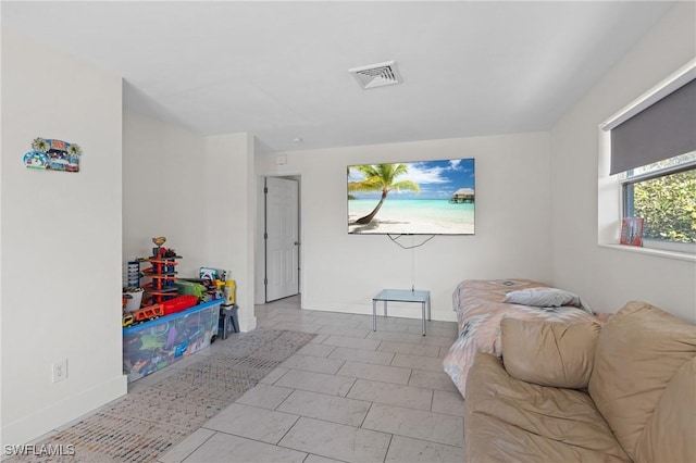 interior space with visible vents and baseboards