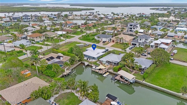 bird's eye view with a water view