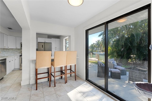 dining space with visible vents