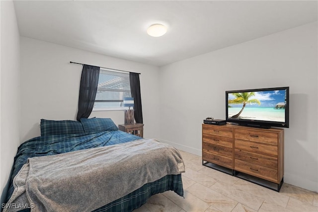 bedroom with baseboards