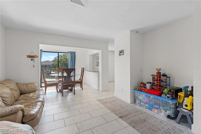 tiled living room with visible vents