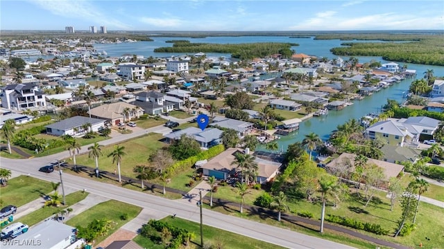 aerial view featuring a residential view and a water view