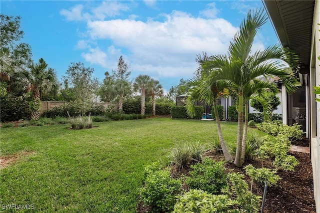 view of yard featuring fence