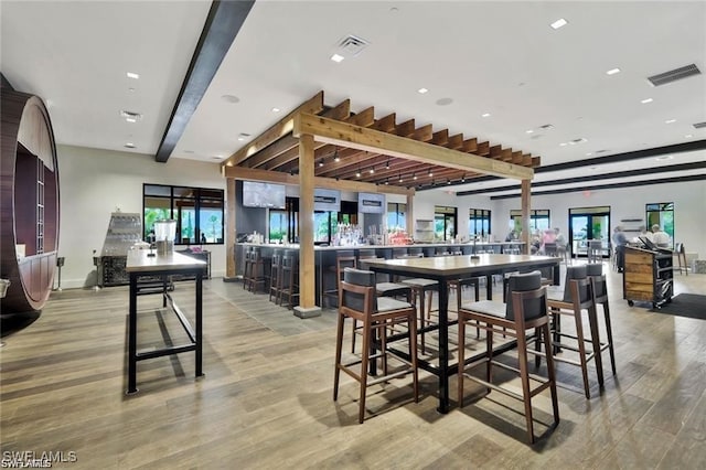 dining area with visible vents, recessed lighting, and light wood-type flooring