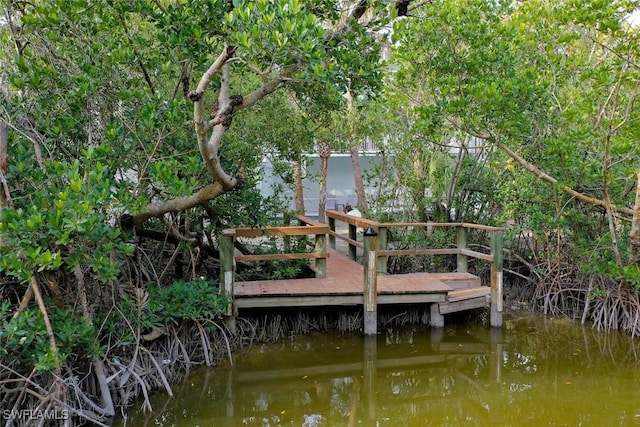 view of dock with a water view