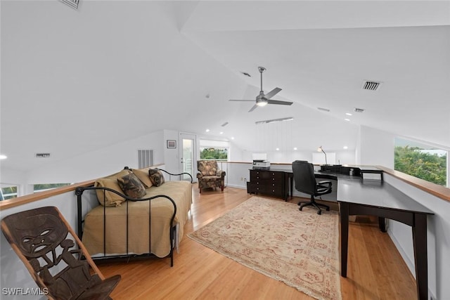 office with ceiling fan, lofted ceiling, and light hardwood / wood-style floors