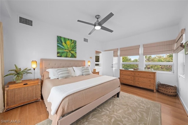 bedroom featuring light wood-type flooring and ceiling fan