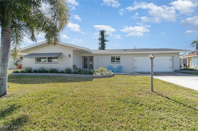 single story home with a garage and a front yard