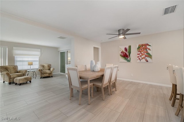 dining room with ceiling fan