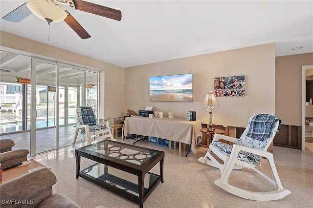 living room featuring ceiling fan