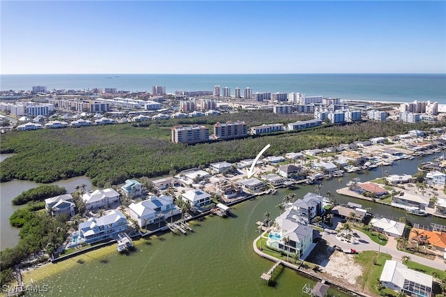 bird's eye view with a water view