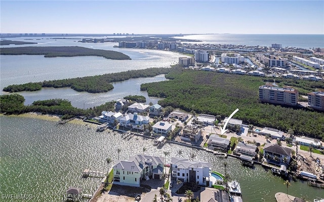 bird's eye view with a water view