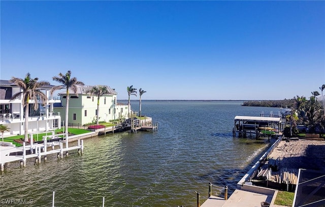 dock area featuring a water view