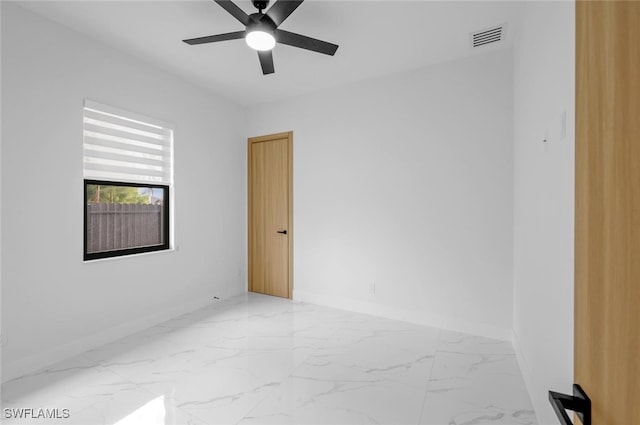 unfurnished room featuring ceiling fan