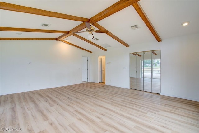 interior space featuring ceiling fan, vaulted ceiling with beams, and light wood-type flooring