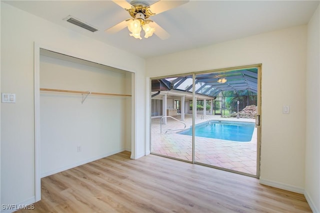 view of pool with ceiling fan