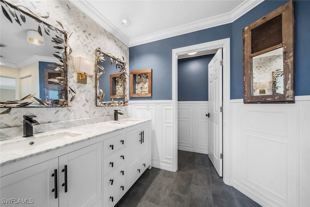 bathroom with vanity and ornamental molding